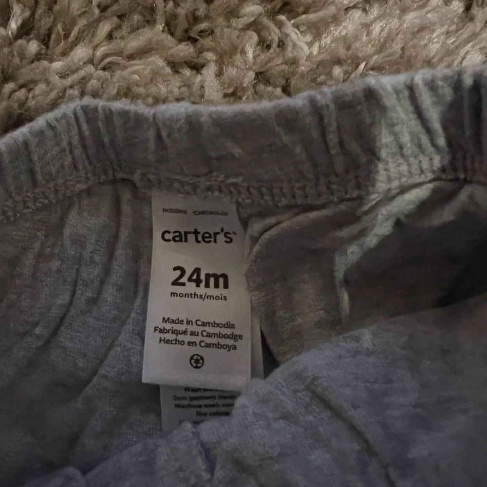 Carters set of two infant shorts,‎ one with watermelon on the bottom